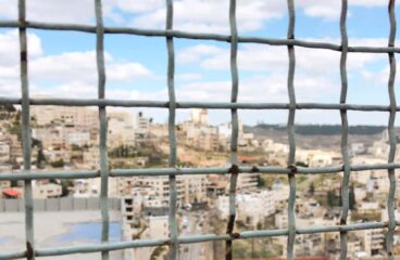 Views of Bethlehem through the fences in the West Bank, Palestine.
