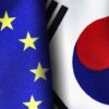 European union and South Korean flags standing side by side