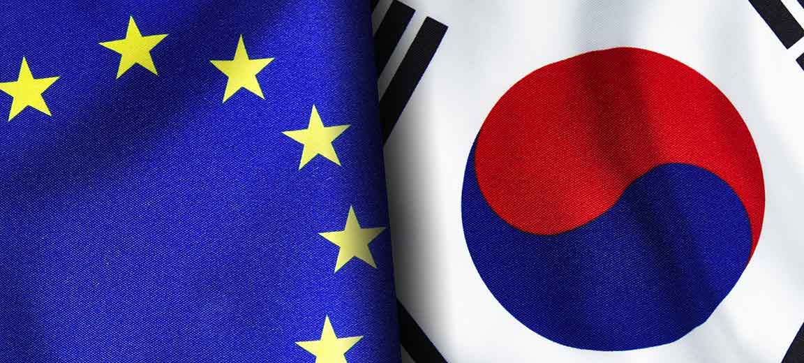 European union and South Korean flags standing side by side