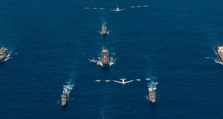Array of aircraft carriers and aircraft in the ocean. Multilateral export controls